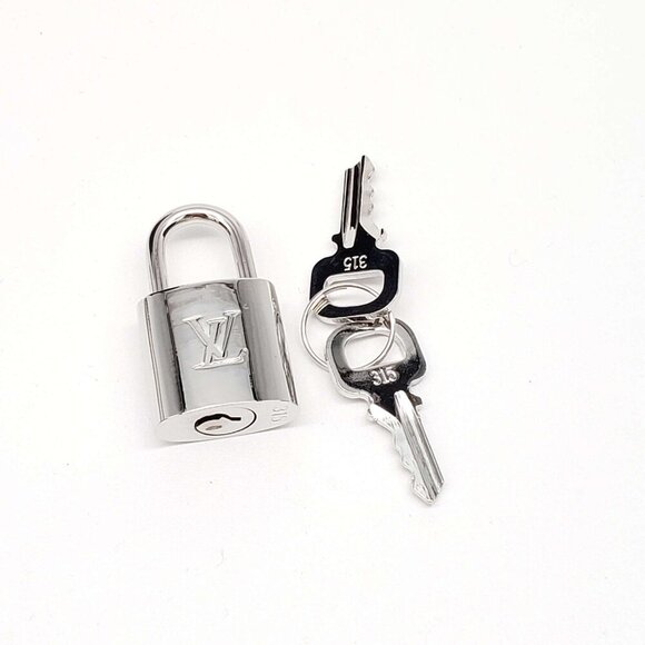 100% Authentic Louis Vuitton 1 Lock and 1 Key Silver Color
